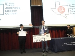 Mr. Yagi of JAGH presents the 1st place award to AURORA Division