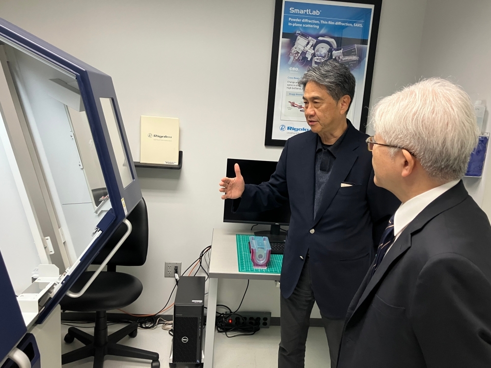 Rigaku Holdings Corp. President Kawakami and Consul-General Naganuma speaking